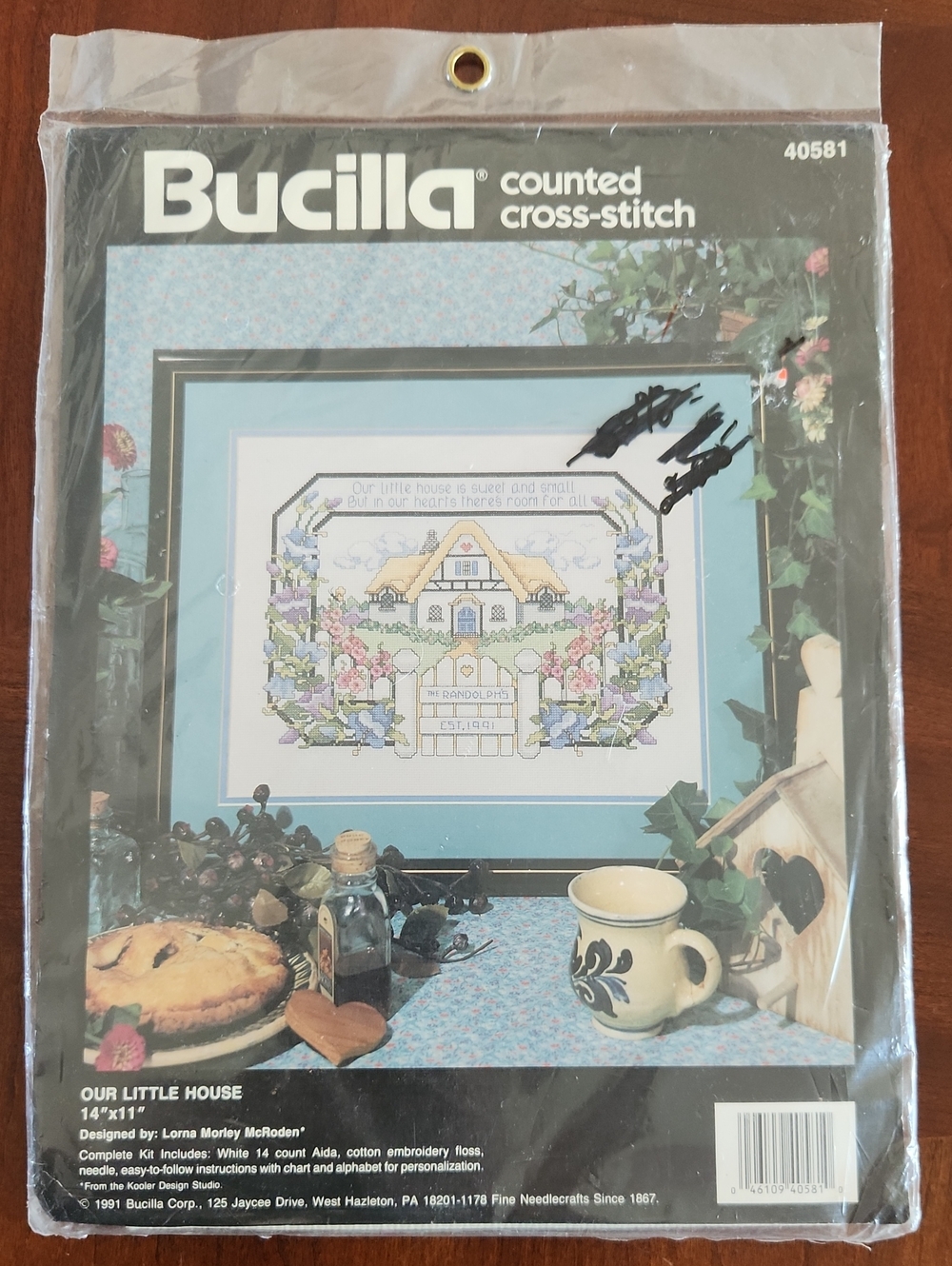 Bucilla counted cross-stitch kit with blue accents